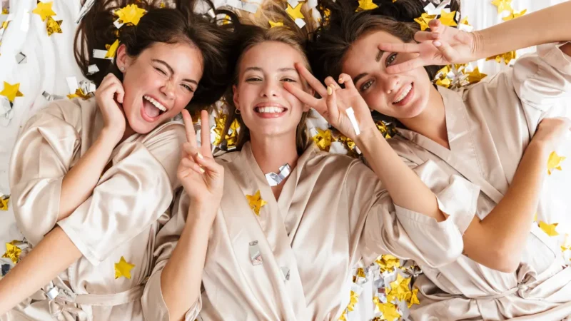 Newly engaged woman celebrating with friends, planning smile prep for her wedding day